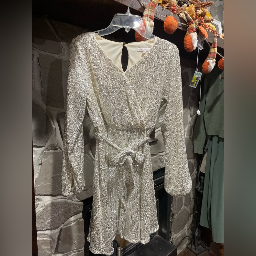 Gold, shiny, girls formal dress. Perfect for a christmas dance!